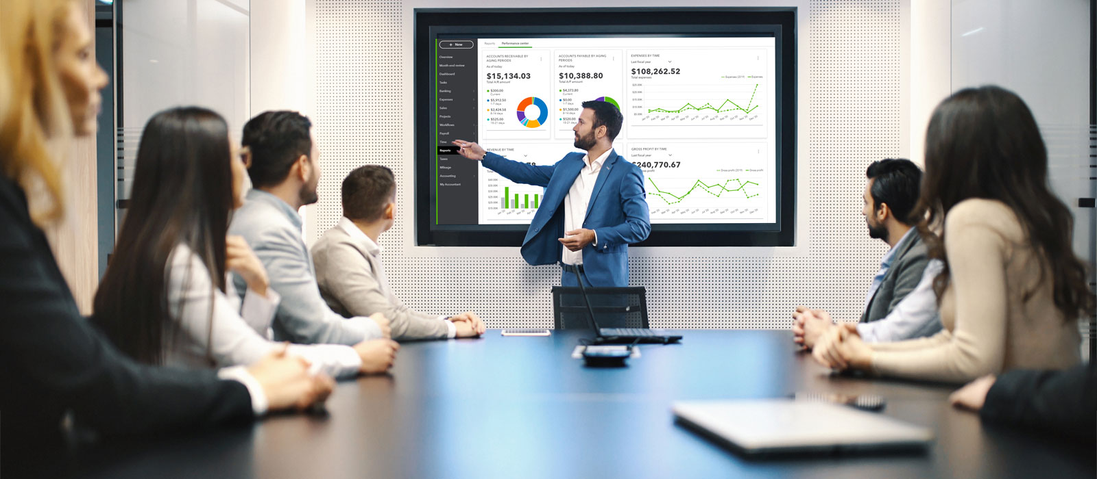 a group of people in a conference room