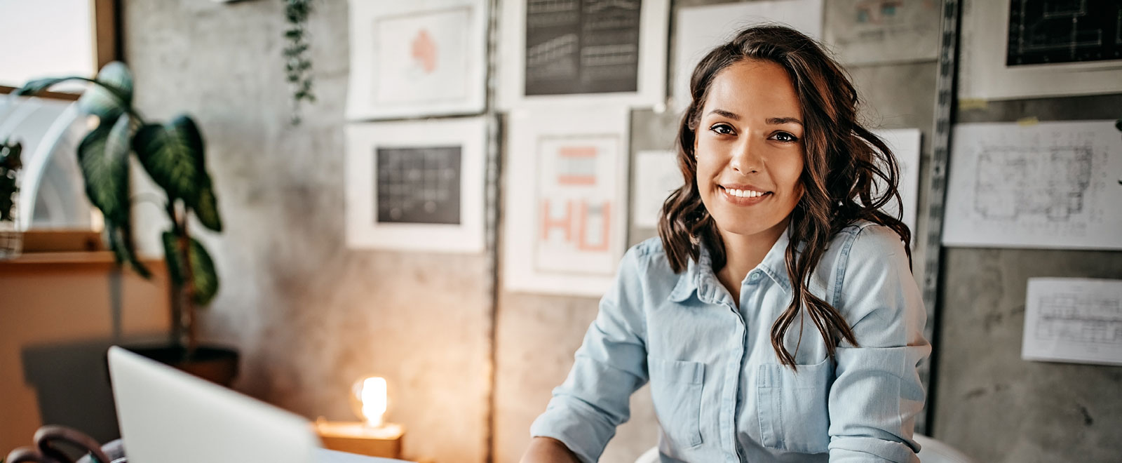 a woman sitting and smiling