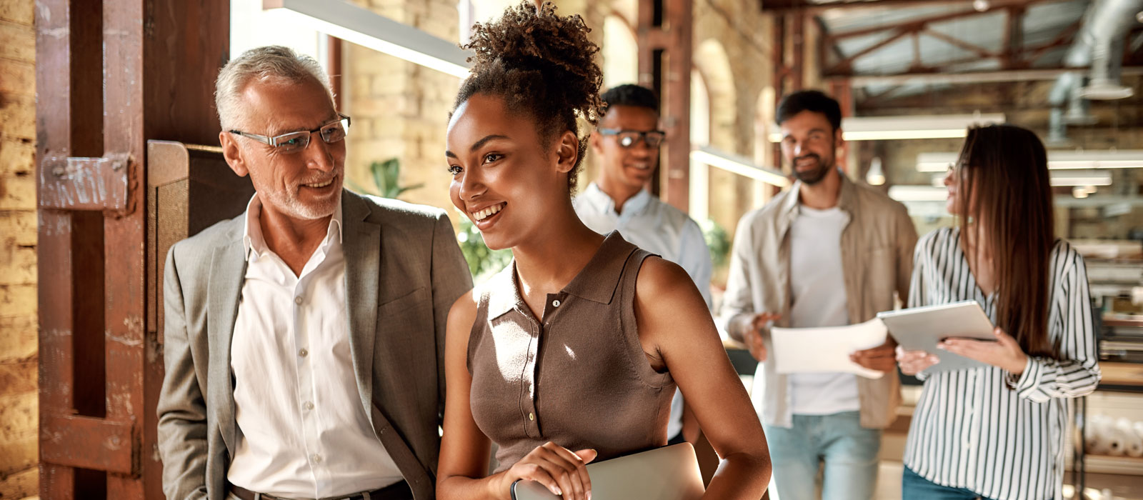 group and people walking and talking