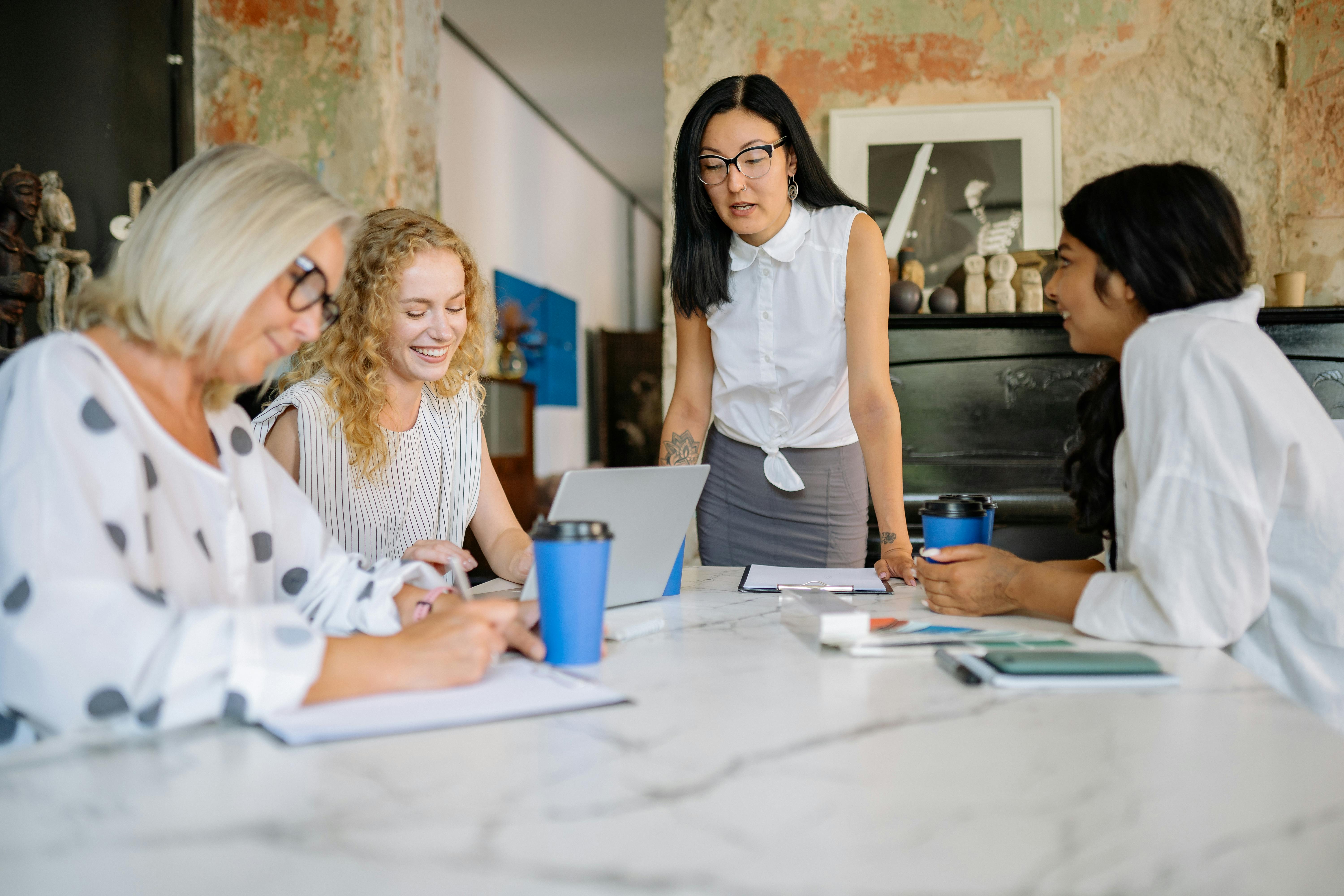 women at table in meeting