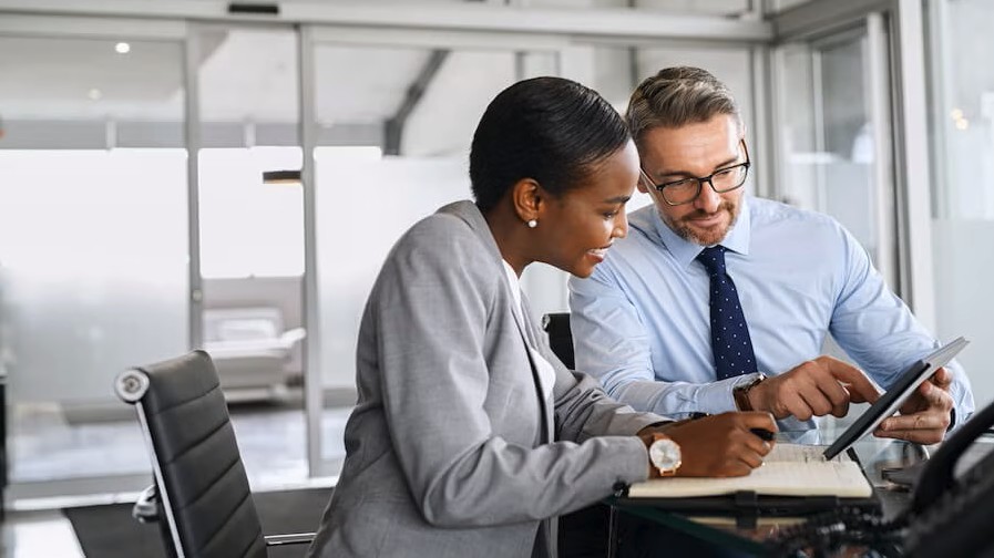 man and women sitting a table