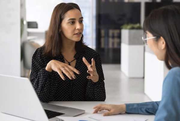 two women talking to each other