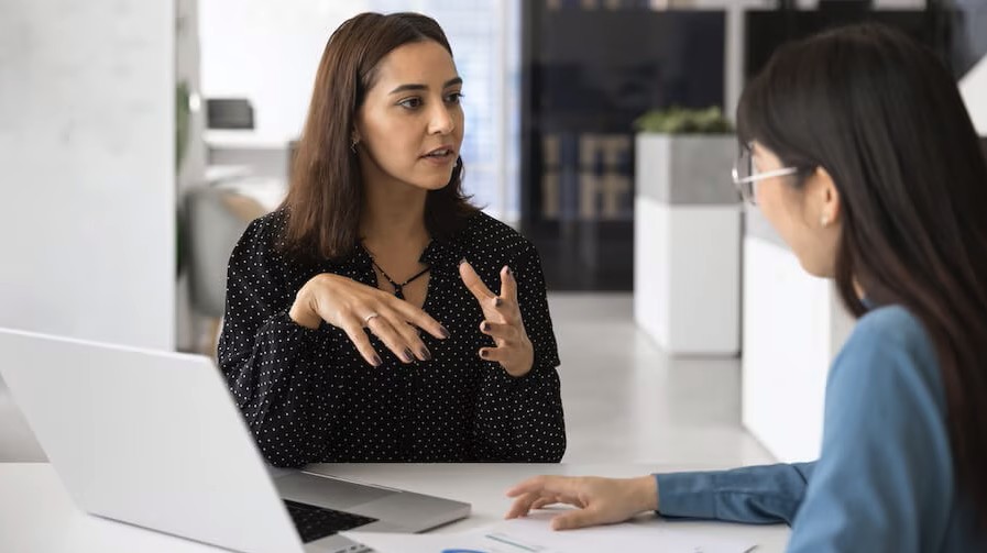 two women talking to each other